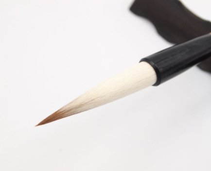 历史上最早的毛笔是用什么做的 他是如何改良的