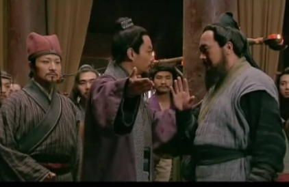 吴用在“以一战定梁山之主”之争中扮演什么样的角色？