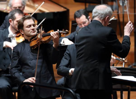 关于拉威尔的评价是怎么样的？他是怎么样一个人