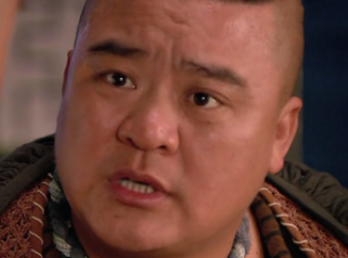 水浒传中打虎将李忠是个什么样的人?鲁智深为何不待见他？