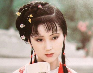 红楼梦中玉带林中挂这句话是什么意思？