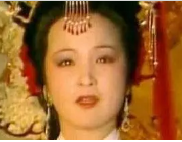 红楼梦中元春的判词上为何会有弓上挂一香橼的图画？